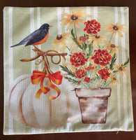 Fall robin with marigolds