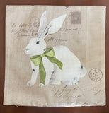 White rabbit with green bow